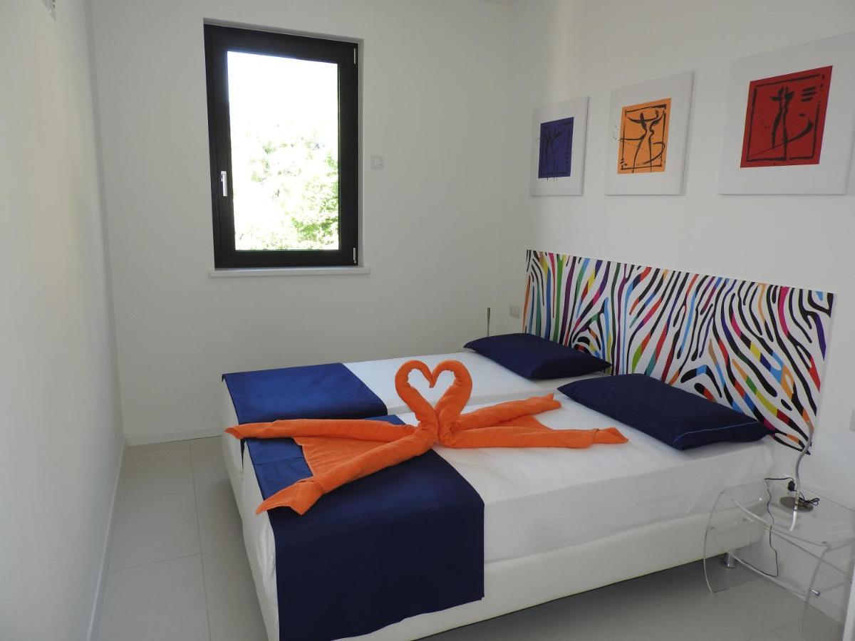 Blue Sky Garda - Sunset Apartment มัลเชซิเน ภายนอก รูปภาพ