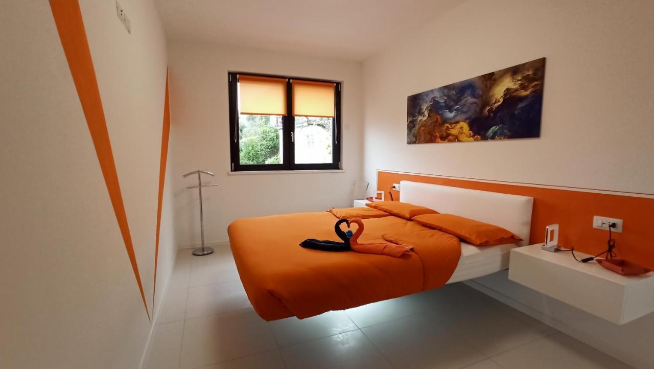 Blue Sky Garda - Sunset Apartment มัลเชซิเน ภายนอก รูปภาพ